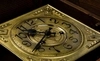 Часы настенные с латунным циферблатом и маятником. Швейцария, первая треть XX века.