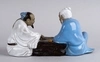 Фарфоровая статуэтка «Два китайца играют в национальную игру». Китай, ХХ век.