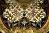 Бронзовый подсвечник, декорированный цветными эмалями. Середина XIX века.