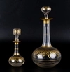 Два графина, вазочка с крышкой и бокал c золоченым декором. <br>Западная Европа, конец ХIХ века.