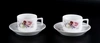 Две кофейные пары с росписью в виде полевых цветов. Россия, фабрика М.С. Кузнецова в Риге, 1920-е годы.