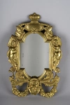 Зеркало в барочной раме с декором в виде сильфид и маскаронов.<br>Западная Европа, конец XIX - начало ХХ века.