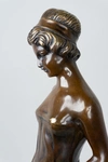 Скульптура в стиле модерн «Девушка с волосами, повязанными лентой».<br>Франция, Париж, фирма L&F Moreau, начало XX века.
