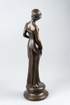 Скульптура в стиле модерн «Девушка с волосами, повязанными лентой».<br>Франция, Париж, фирма L&F Moreau, начало XX века.