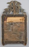 Зеркало в деревянной резной раме с начётником в виде флейты и мандолины.<br>Франция, 1914 г.