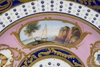 (Севр. 1793 г.) Тарелка с живописными резервами с тремя морскими пейзажами и бабочками. <br>Франция, Севрская мануфактура, живописец и позолотчик Жак Фонтен, 1793 г.