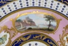 (Севр. 1793 г.) Тарелка с живописными резервами с тремя морскими пейзажами и бабочками. <br>Франция, Севрская мануфактура, живописец и позолотчик Жак Фонтен, 1793 г.