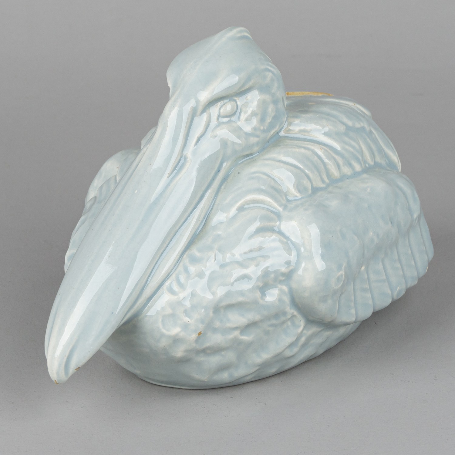 Копилка в виде сидящего пеликана.<br>Франция, конец XIX-начало ХХ века.