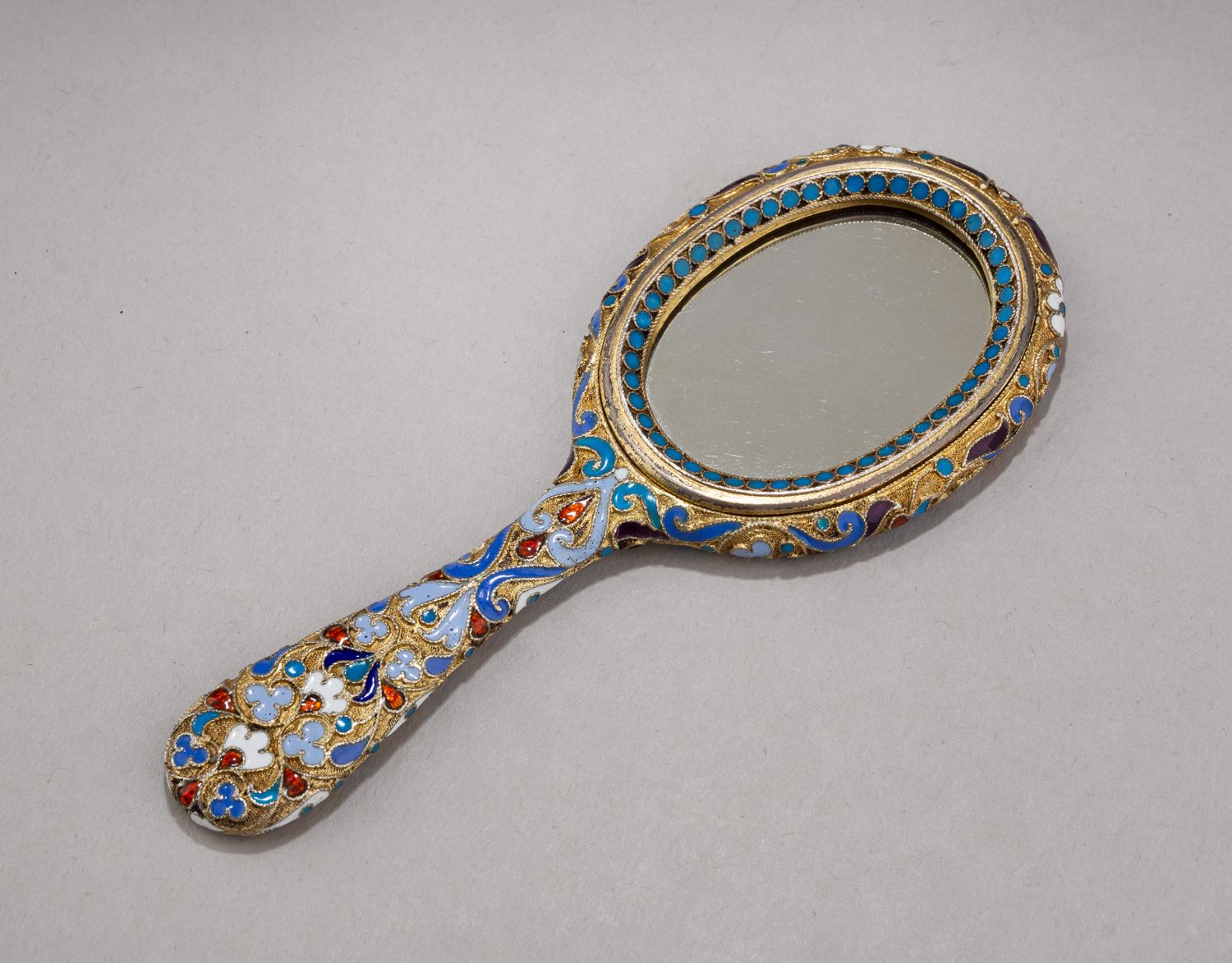 Зеркало, декорированное эмалью по скани. <br>Россия, Санкт-Петербург, Гарберг А.Ф.(?), 1880-1898 годы.