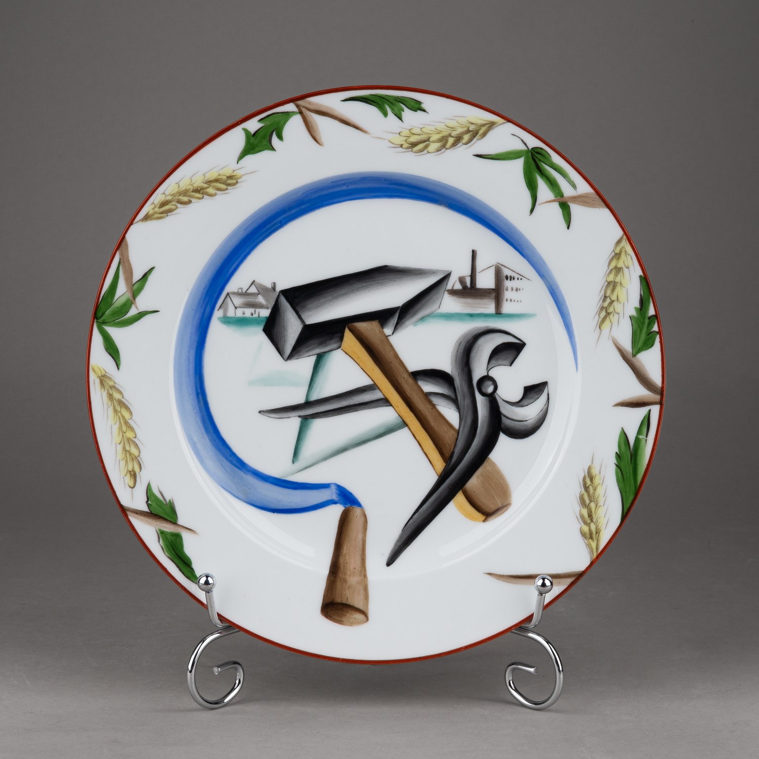 (С экспертизой Кумзеровой) Агитационная тарелка с изображением серпа, молота и клещей. 
 Государственный фарфоровый завод, автор  – Розендорф Елизавета Бернгардовна, 1920.