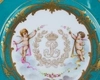 Тарелка с композицией «Путти, играющие с цветами» и монограммой короля Луи Филиппа.