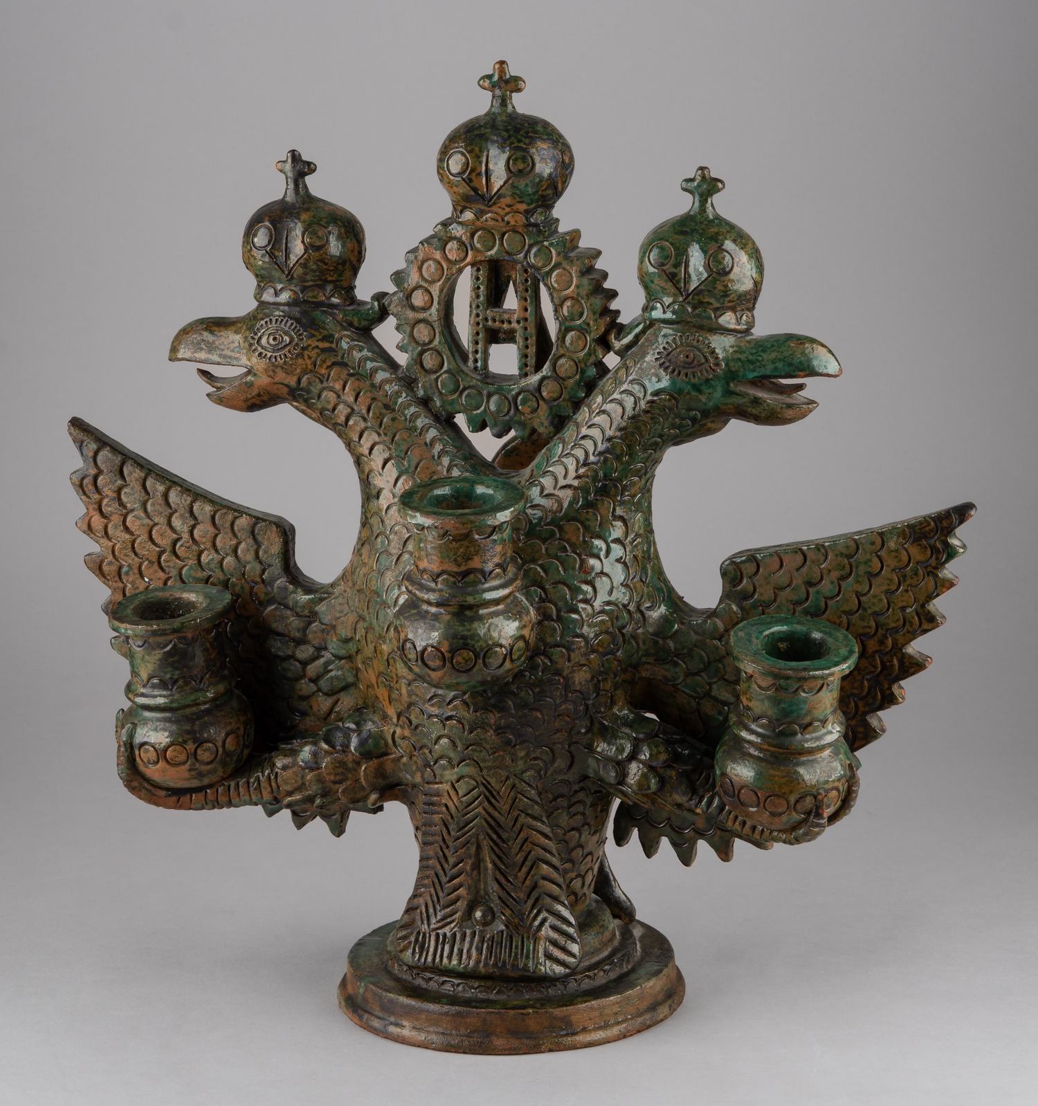 (Уникат. Императорский заказ К 300-летию дома Романовых) Скульптура-подсвечник «Двуглавый орел с инициалами Императора Николая II и императрицы Александры Федоровны». <br>Россия, Санкт-Петербург, 1910-е годы.