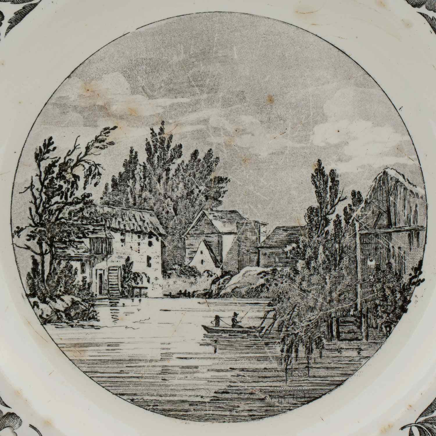 (Киево-Межигорская мануфактура) Тарелка с изображением пейзажа и орнамента из анютиных глазок. 
Россия, Киево-Межигорская мануфактура, 1836.