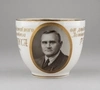 (Экспонат для Музея ЛФЗ). Уникальная чашка 1934 года от Директора ЛФЗ Я.М. Ратуша ко дню рождения революционера К.И. Янушкевича. СССР, Ленинградский фарфоровый завод, 1934.