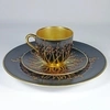 (Royal Worcester) Кофейная пара и десертная тарелка с росписью в виде золотых веточек с красными ягодами.<br>Англия, Royal Worcester, 1916 (чашка и блюдце), 1917 (десертная тарелка).