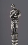 (Грачев) Ложка для подстаканника с фигуркой крестьянина с краюхой хлеба. 
Россия, Санкт-Петербург, фирма поставщика Высочайшего двора «Фабриканта Серебряных и золотых изделий Грачева», 1880-1890-е годы.