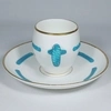Чашка с блюдцем с декором в виде бирюзового каната.
Англия, Brown-Westhead Moore & Co, 1873.
