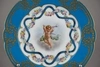(ИФЗ) Тарелка из Александринского сервиза с изображением купидона.
Россия, Императорский фарфоровый завод, 1899.